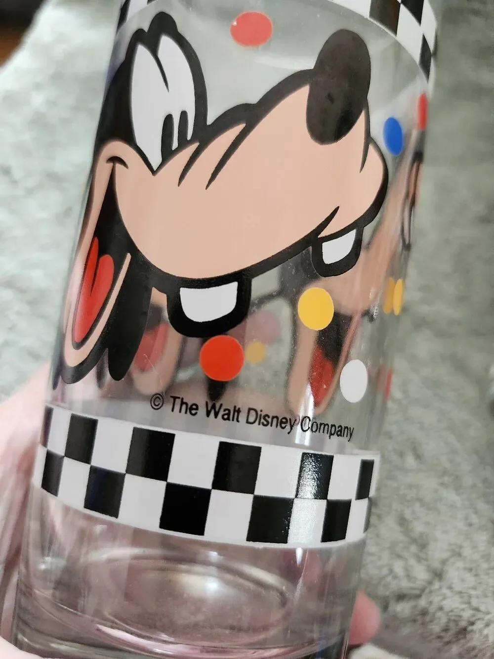 This is a set of vintage Goofy drinking glasses manufactured by Anchor Hocking f